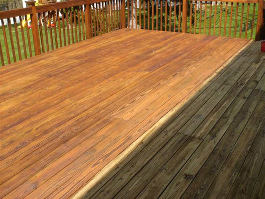 Pressure washing a wood deck